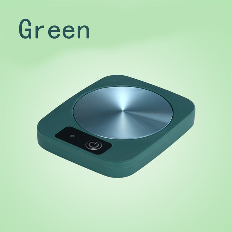 a green square object with a silver circle on it