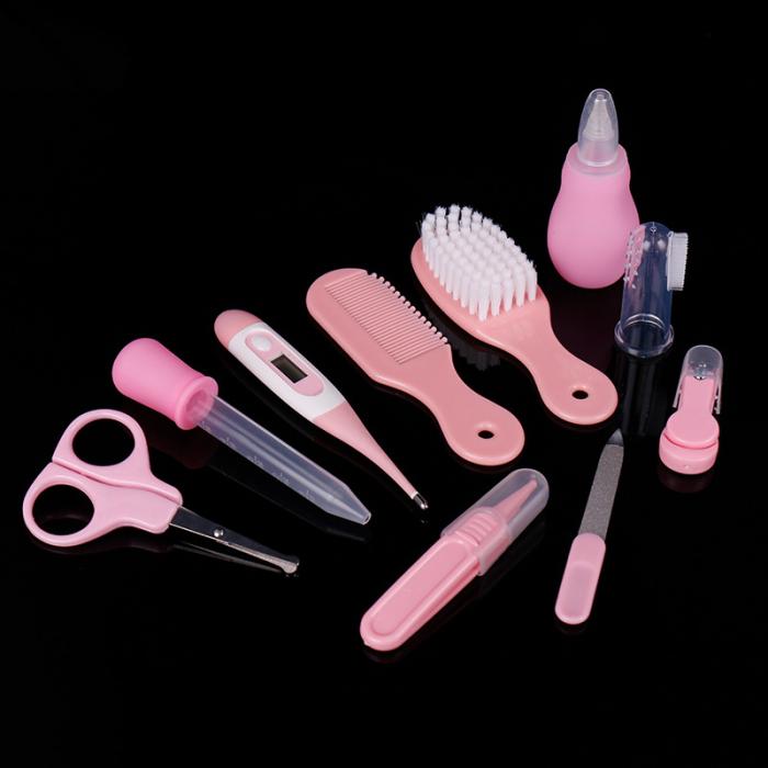 a group of pink baby care items