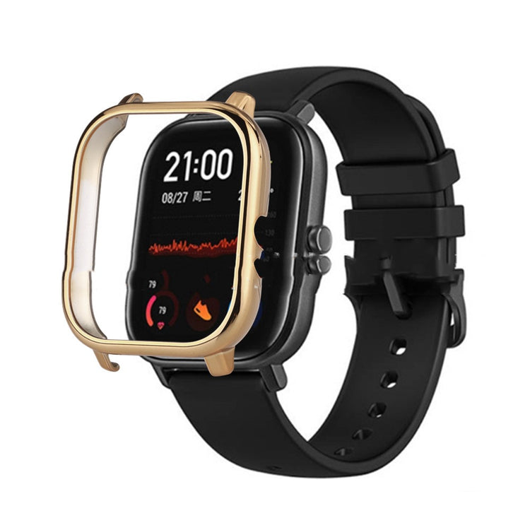a smart watch with a gold case