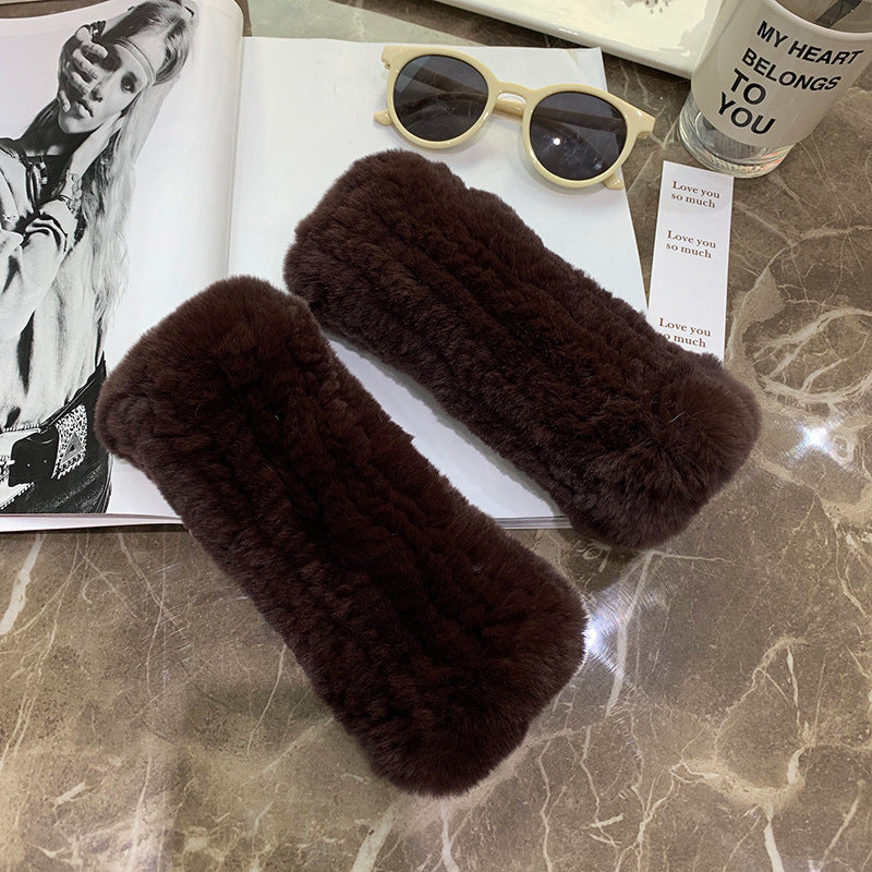 a pair of fur cases on a book