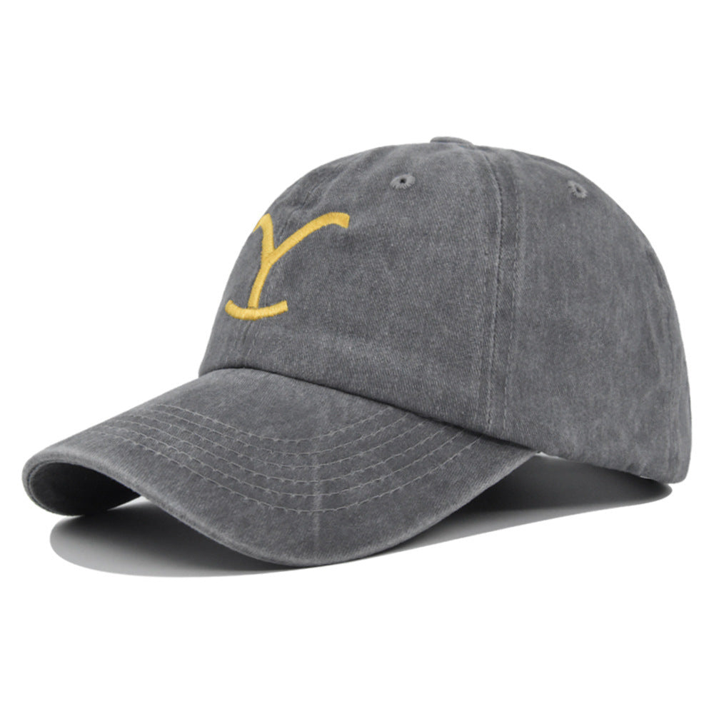 a grey hat with a yellow y on it