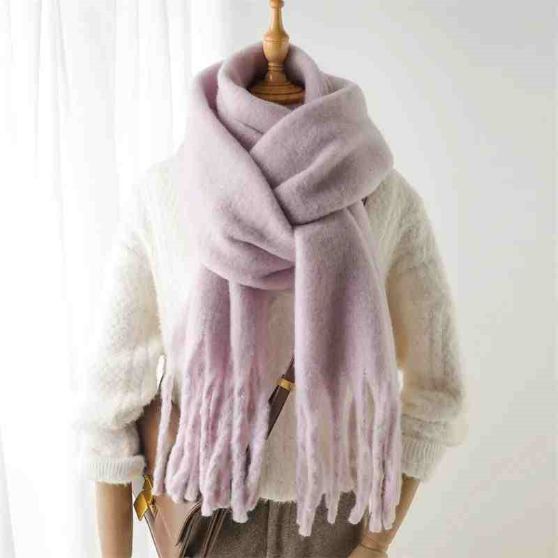 a mannequin wearing a scarf
