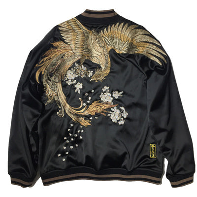 a black jacket with gold and white phoenix on it
