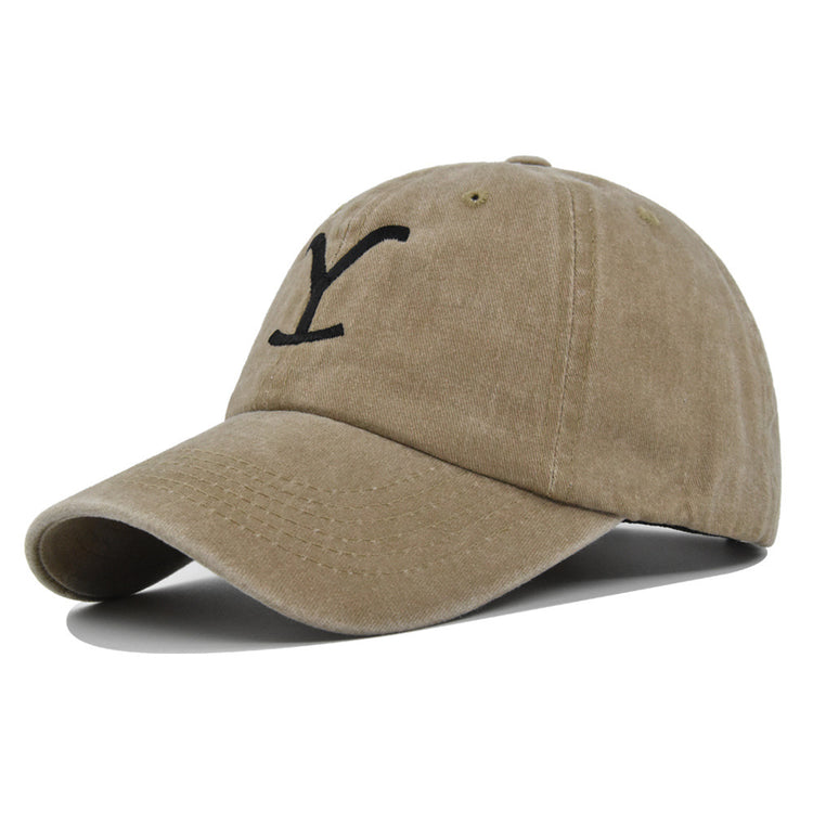 a brown hat with a black y on it