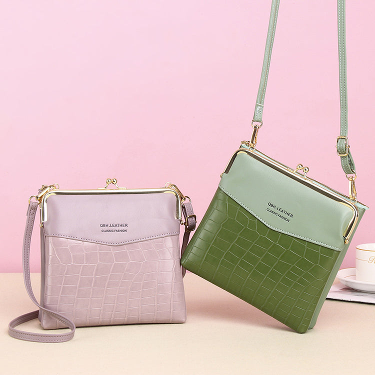 two purses on a table