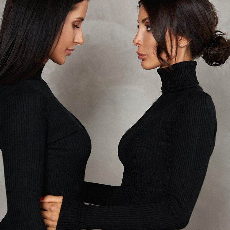 two women in black dresses