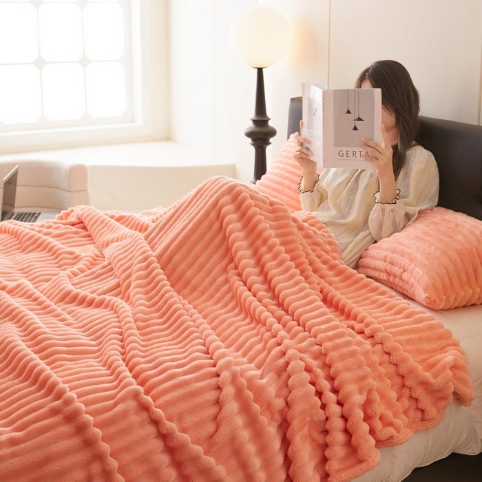 a woman reading a book in bed