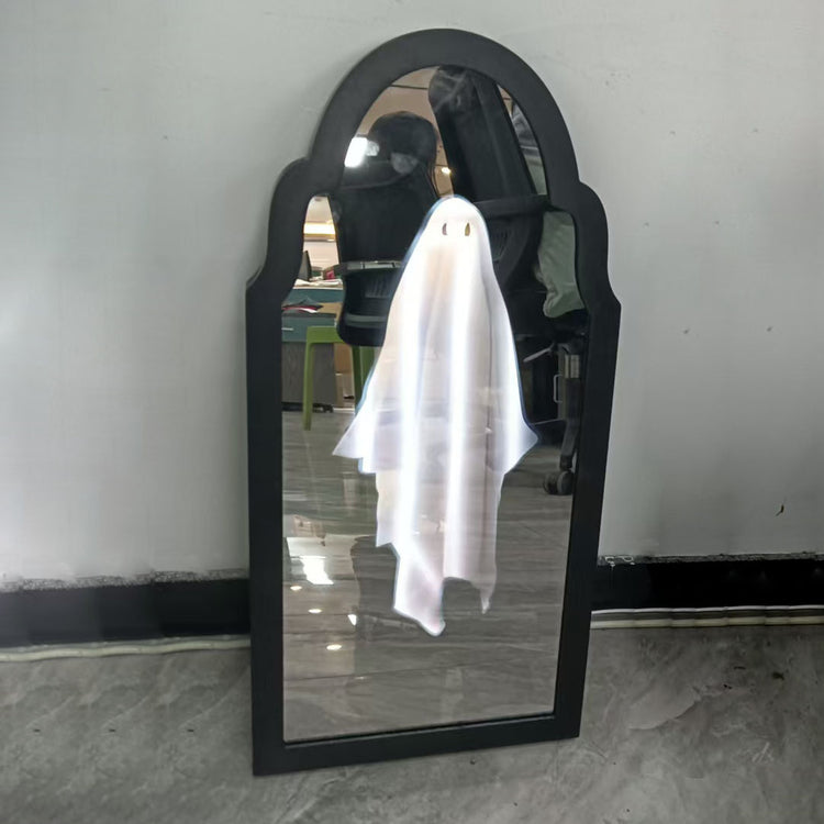 a mirror with a ghost on it