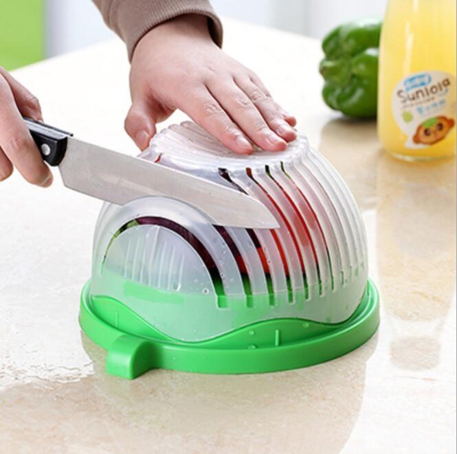a person cutting a tomato