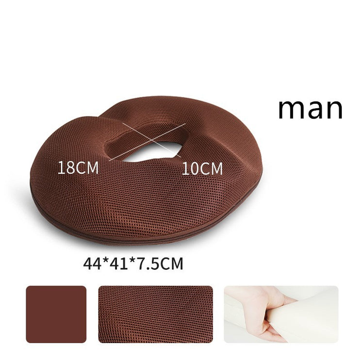 a brown pillow with a man's hand