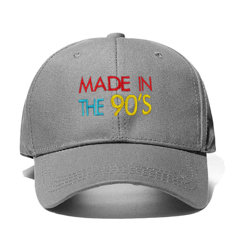a grey hat with red blue and yellow text