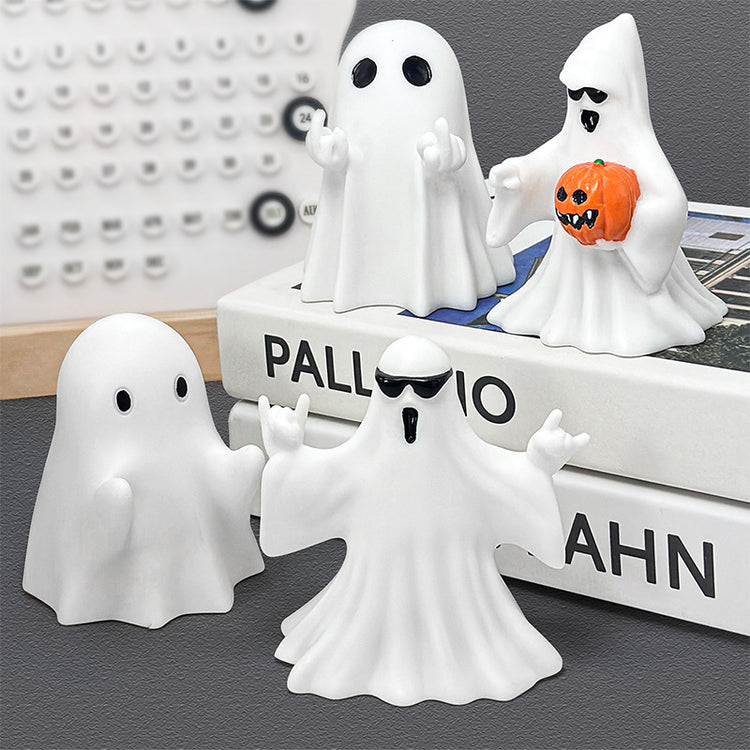 a group of white ghosts on a book