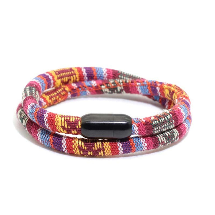a colorful bracelet with a black bead