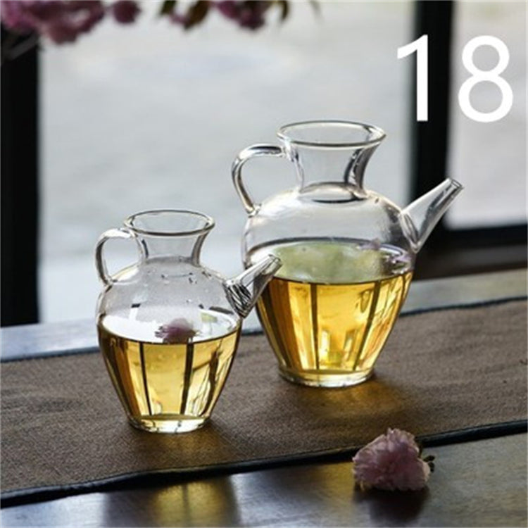 a couple of glass jugs with liquid in them