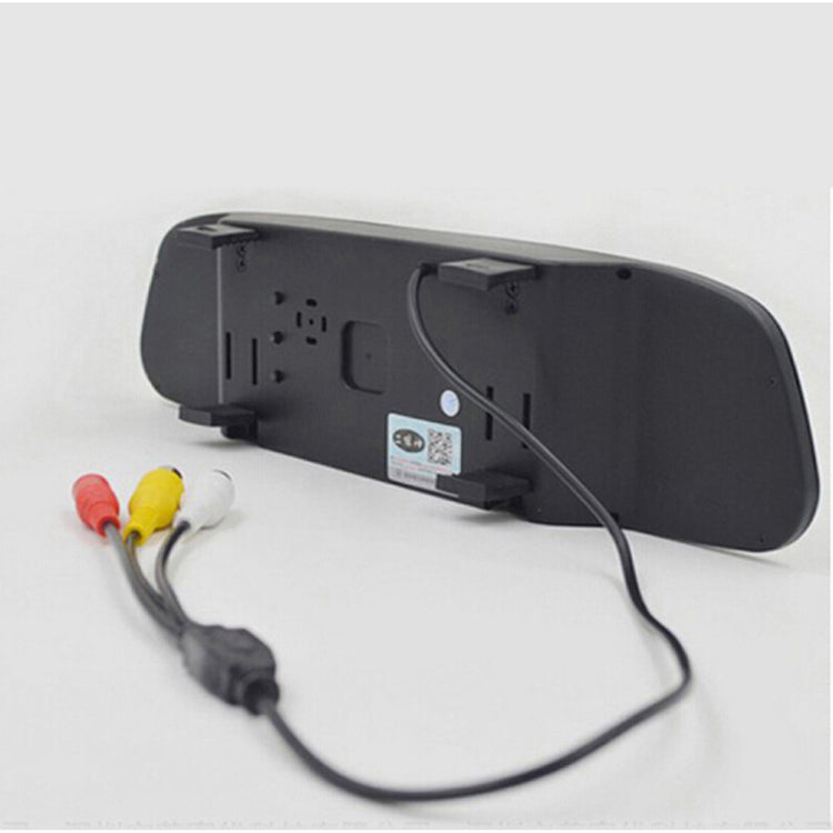 a black rectangular object with wires