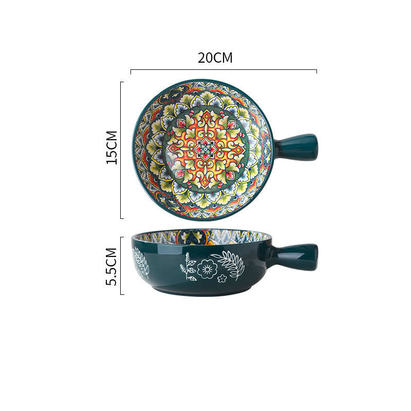 a green bowl with a colorful design