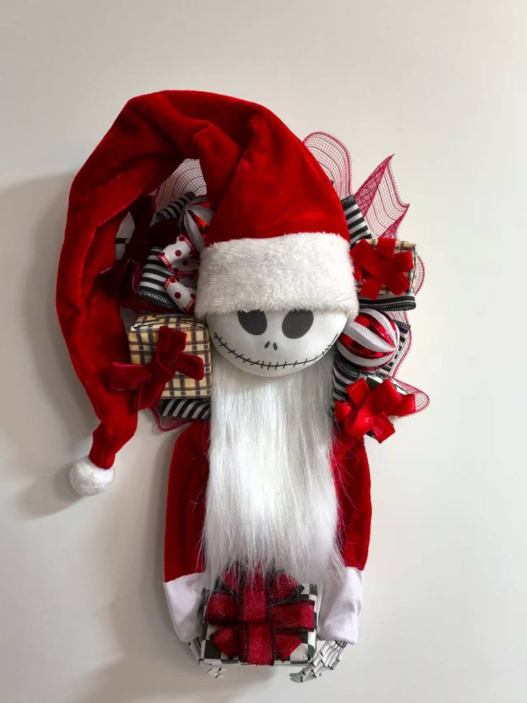a santa claus wreath with a white beard and red hat
