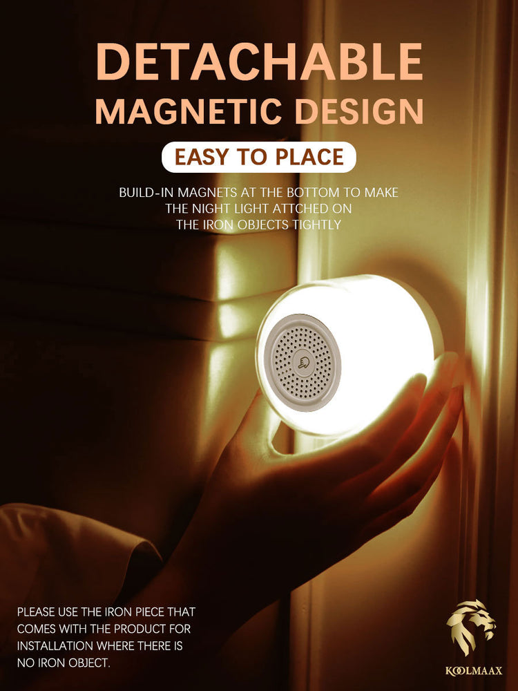 a hand holding a round light