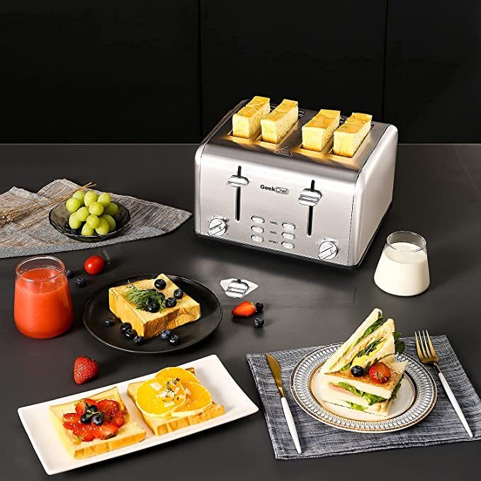 a toaster with food on it