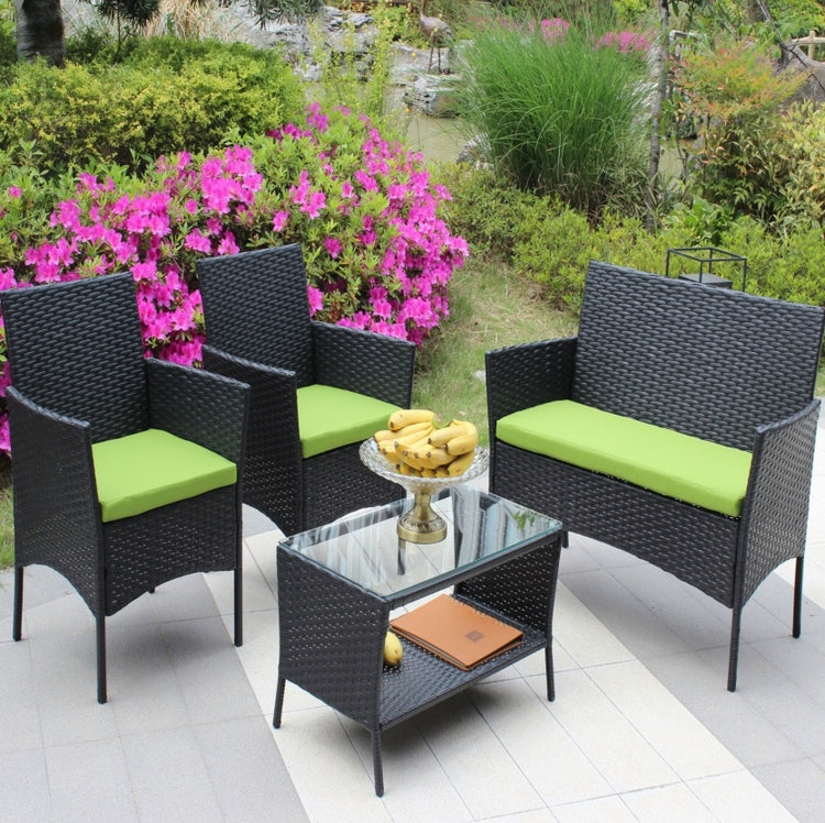 a group of chairs and a table on a patio