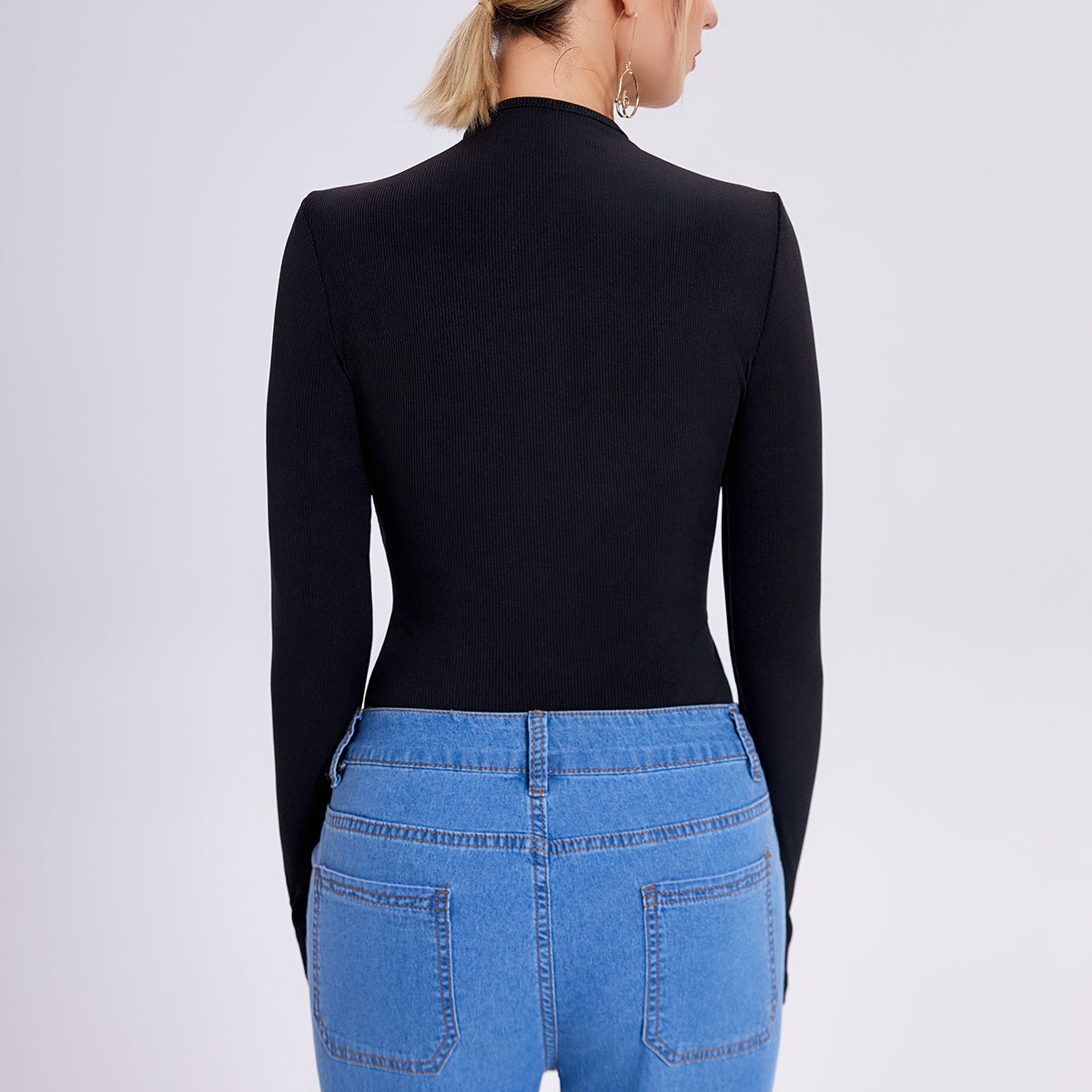 a woman in a black shirt