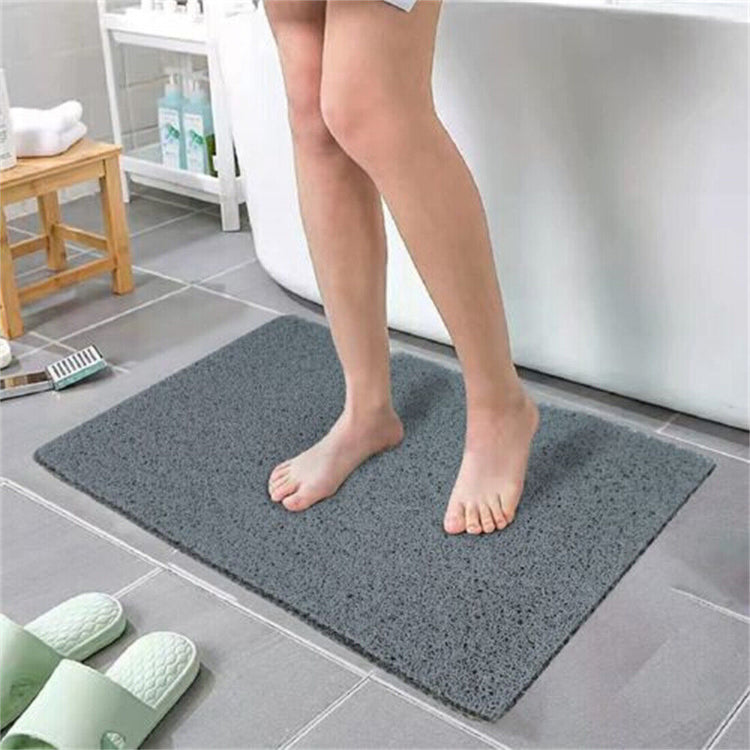 a person standing on a rug