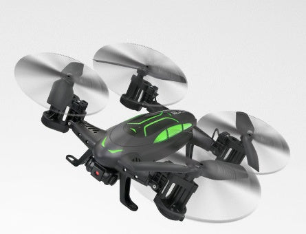 a black drone with green lights