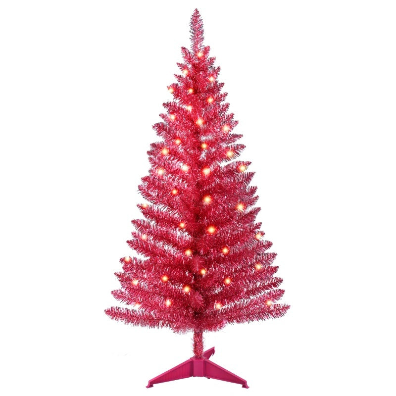 a pink christmas tree with lights