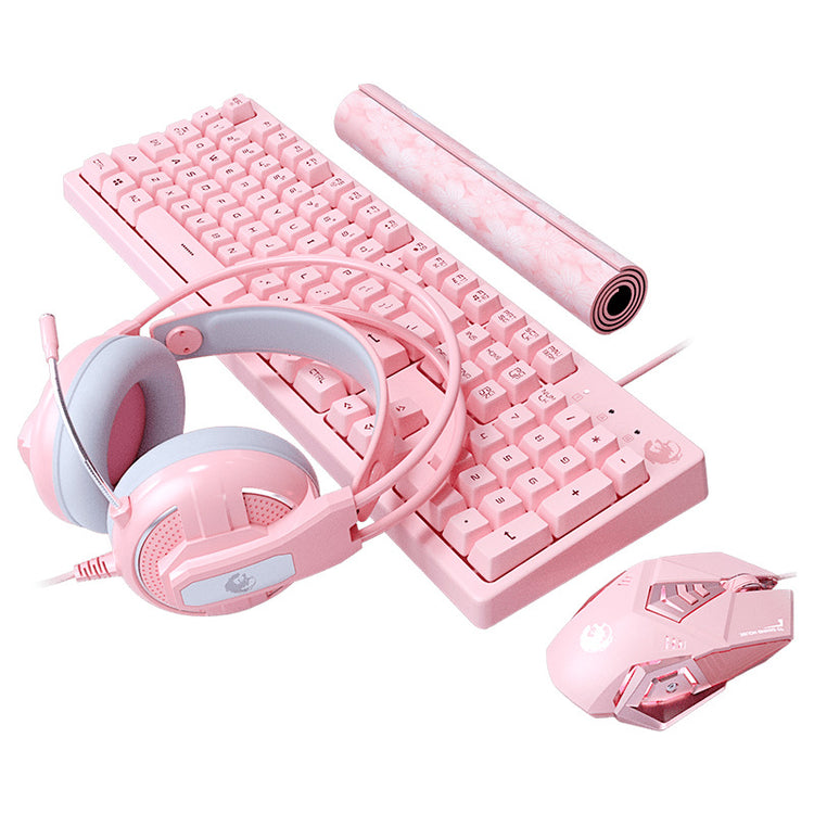 a pink keyboard and headphones