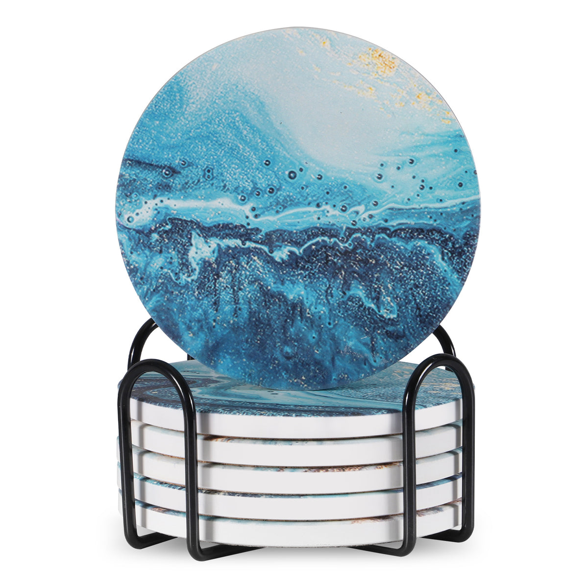 a stack of coasters with blue and white designs