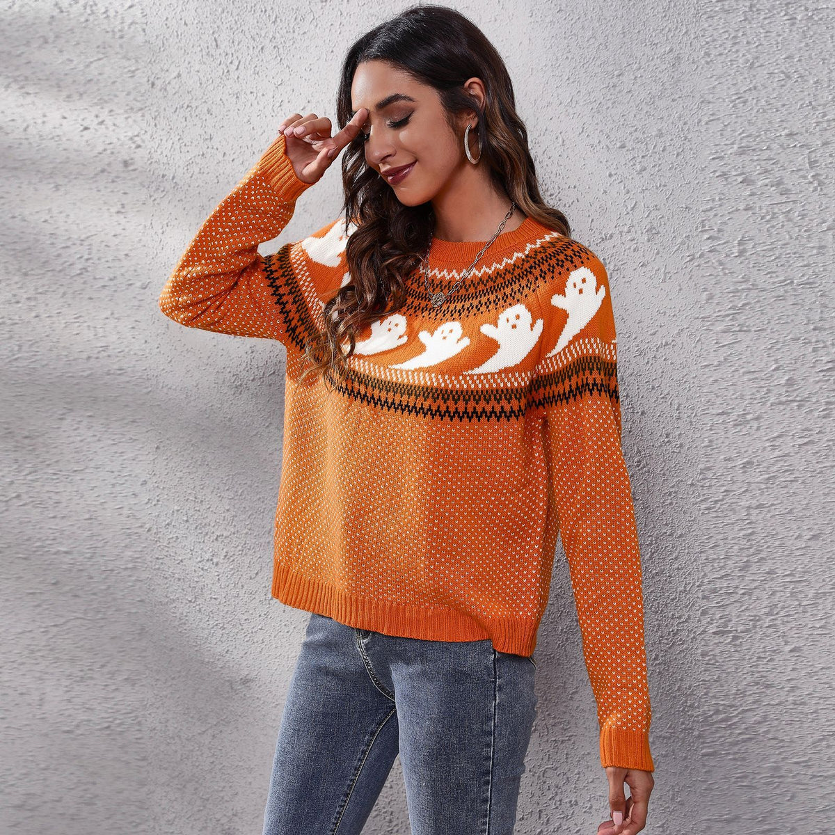 a woman in a sweater