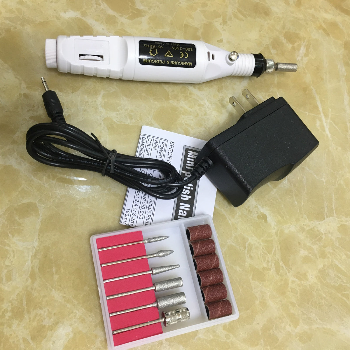 a nail drill and accessories
