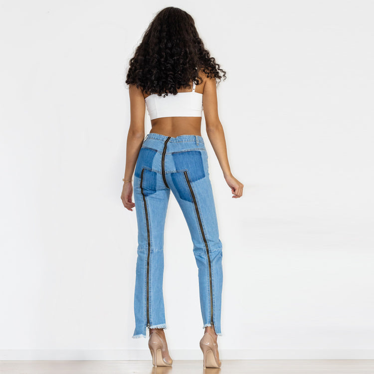 a woman in blue jeans