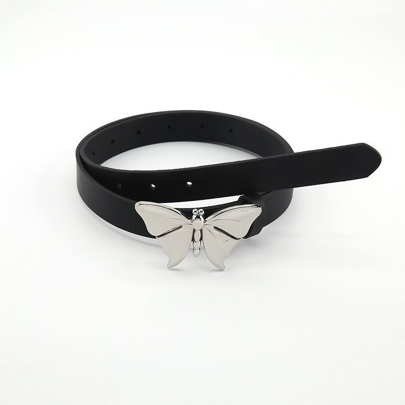 a black belt with a silver butterfly buckle