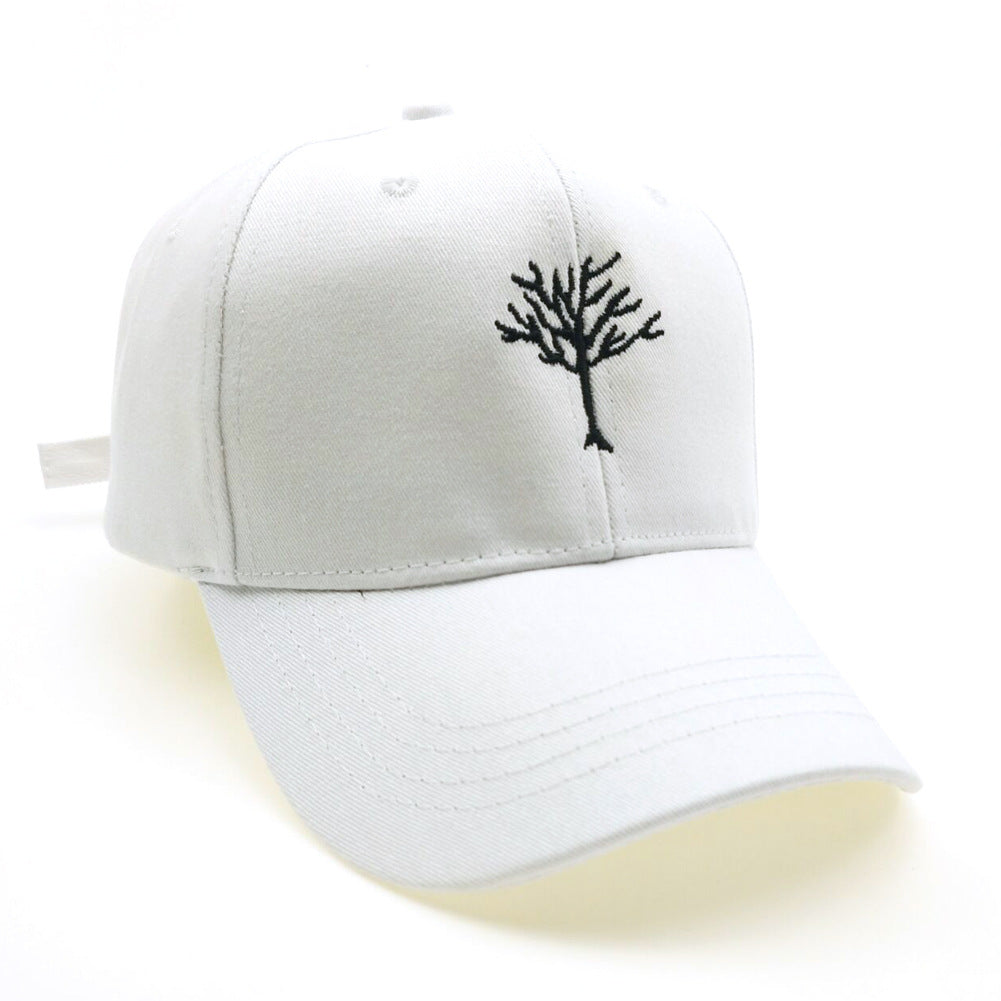 a white hat with a tree on it