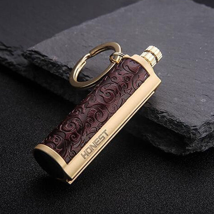 a key chain on a black surface