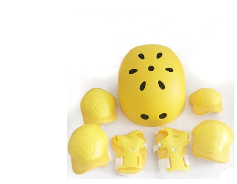 a yellow helmet and elbow pads