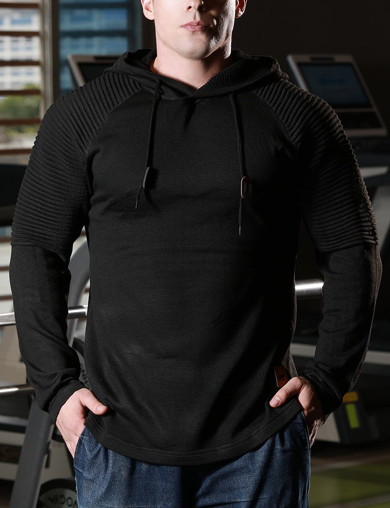 a man in a black hoodie
