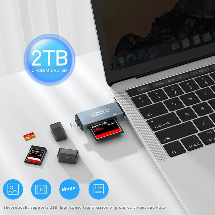 a laptop with memory cards and flash drives