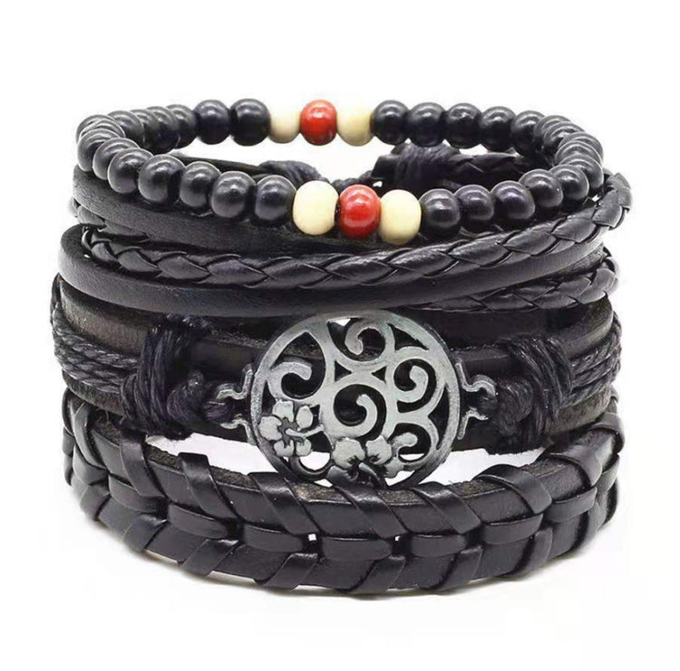 a stack of black leather bracelets