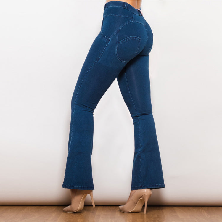 a woman wearing blue jeans