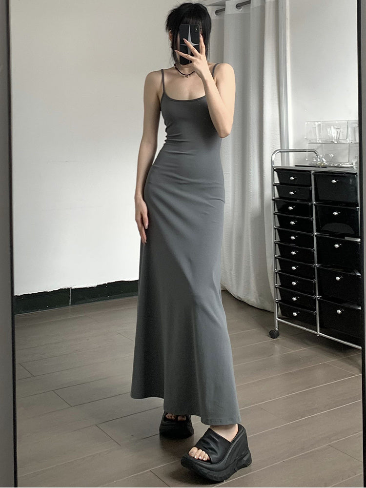 a woman in a long dress