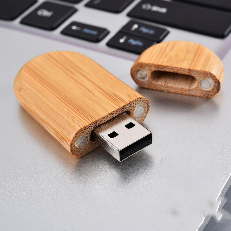 a wooden usb drive on a laptop