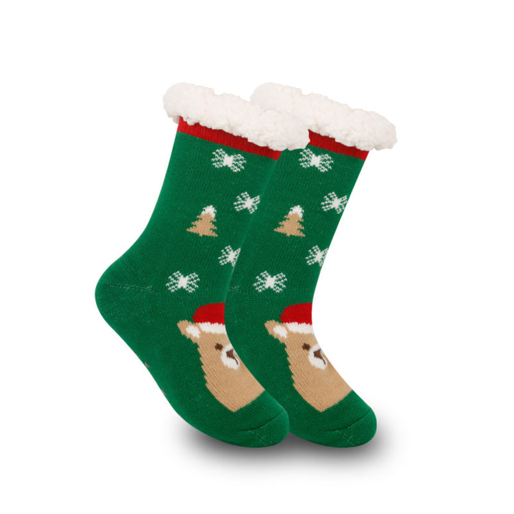 a pair of green socks with a deer design