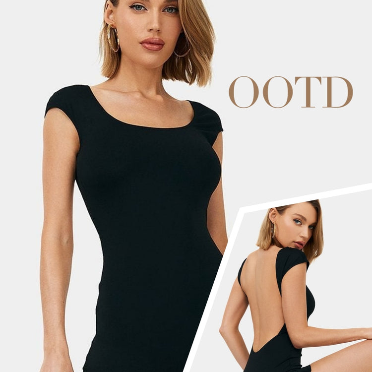 a woman in a black dress