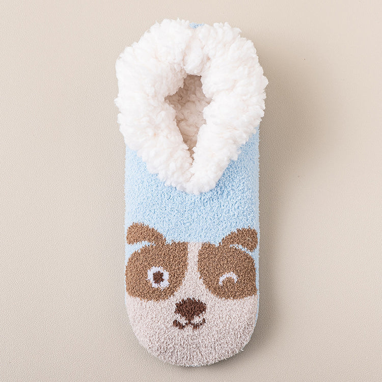 a blue and white slipper with a dog design