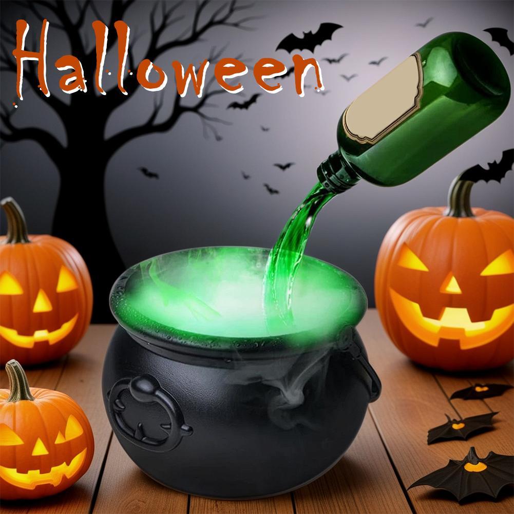 a green liquid being poured into a cauldron