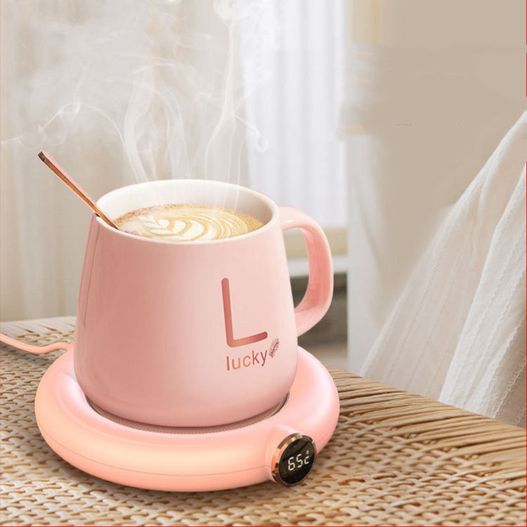 a cup of coffee with a spoon in it