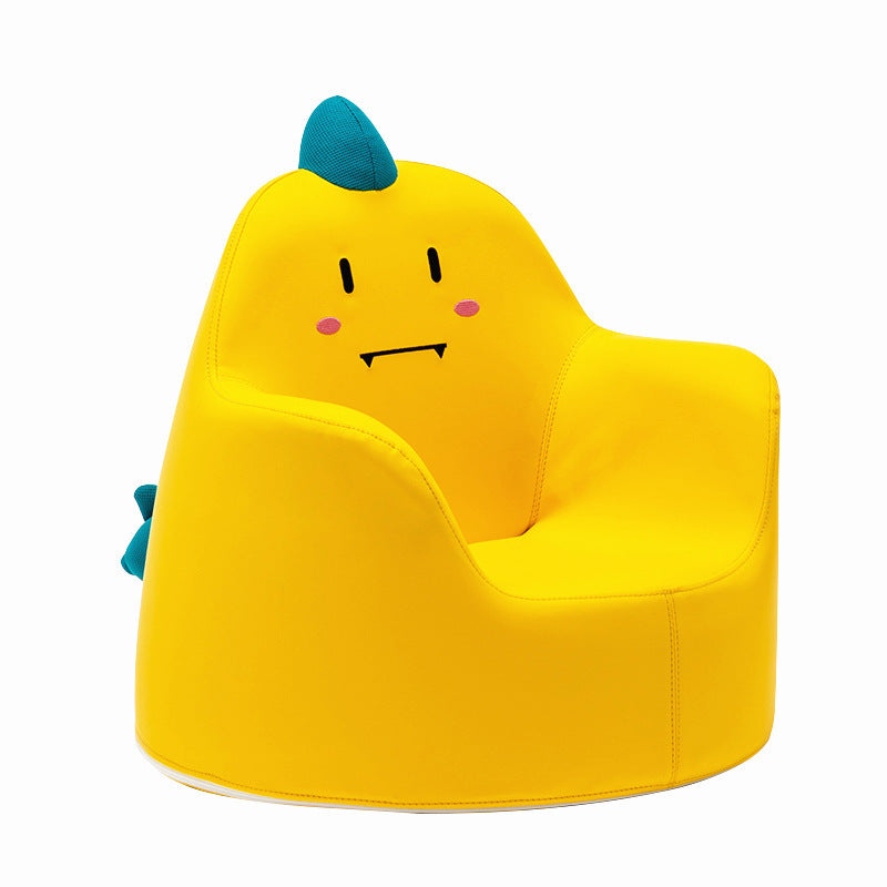 a yellow chair with a face on it