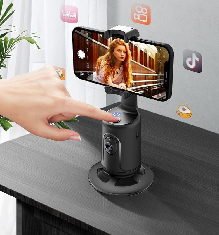 a hand pointing at a phone